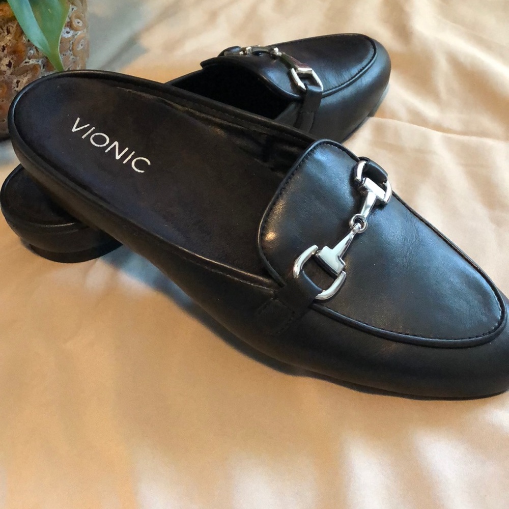 Bionic black mules.